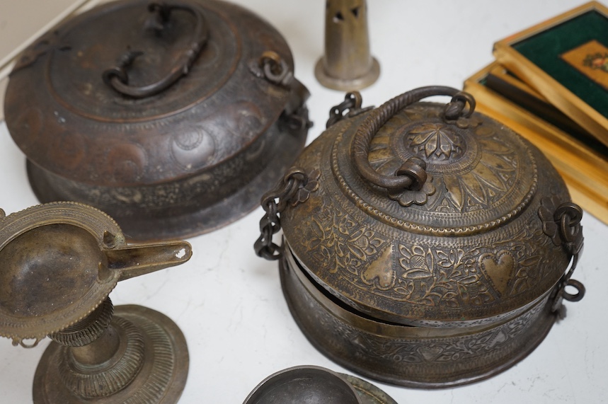 An Ethiopian Coptic processional cross, two Indian brass betel nut boxes together with other metalware and a set of miniature paintings, largest 51cm high. Condition - fair